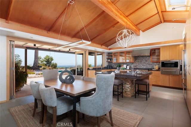 10551 Hillsboro Rd, North Tustin, CA 92705 - dining space with wooden ceiling and light tile patterned floors