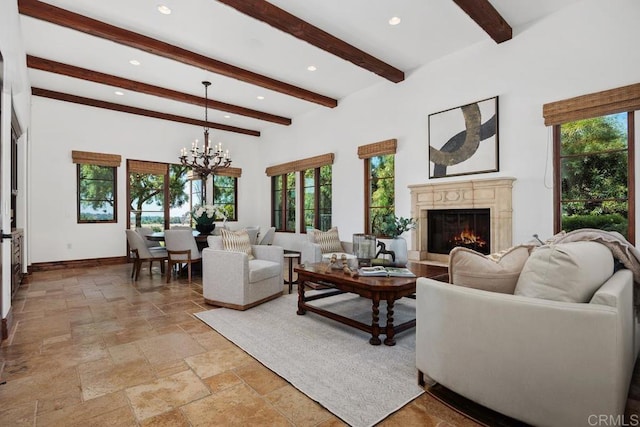 8183 Doug Hill, San Diego, CA 92127 - living area with beam ceiling, a chandelier, a fireplace, stone tile floors, and recessed lighting