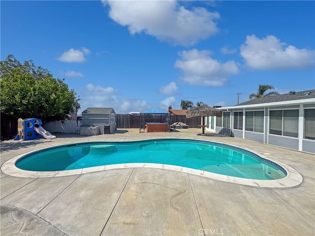 19891 Athenon Ave, Perris, CA 92570 - view of pool featuring a patio area, a fenced backyard, and a sunroom