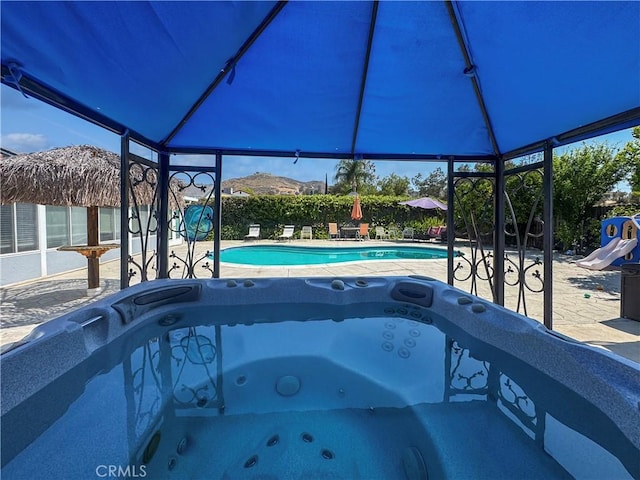 19891 Athenon Ave, Perris, CA 92570 - outdoor pool with a hot tub and a patio area
