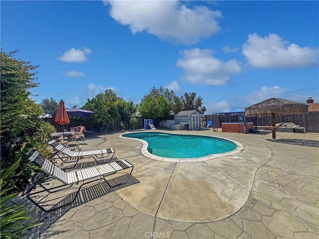 19891 Athenon Ave, Perris, CA 92570 - view of pool with a patio, a storage unit, and a fenced backyard