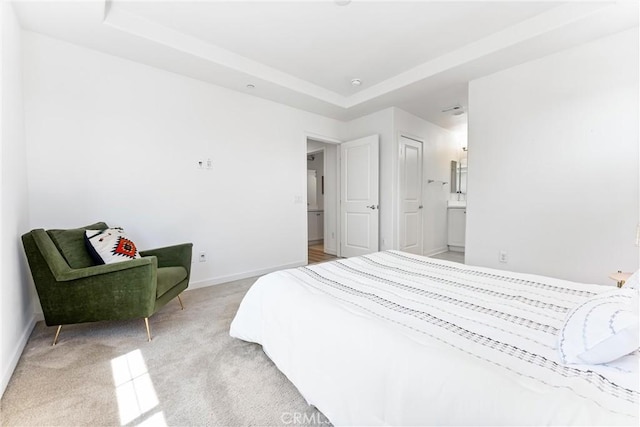 1166 Newberry Ln Unit 1, Claremont, CA 91711 - bedroom featuring light colored carpet, a tray ceiling, and ensuite bath
