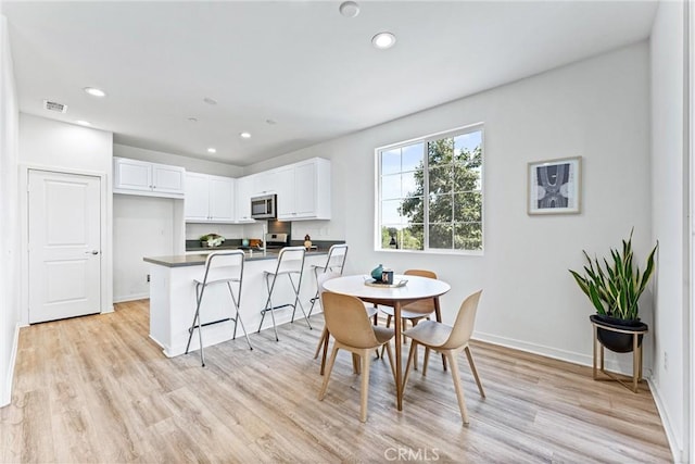 1166 Newberry Ln Unit 1, Claremont, CA 91711 - dining space featuring recessed lighting and light wood-style flooring