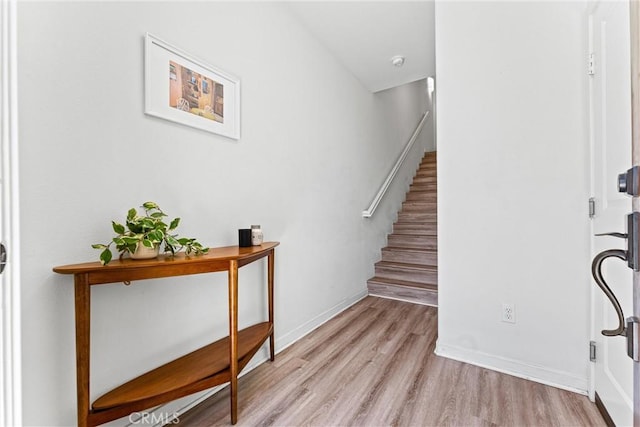 1166 Newberry Ln Unit 1, Claremont, CA 91711 - foyer featuring light wood-type flooring and stairway