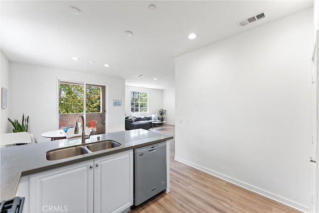 1166 Newberry Ln Unit 1, Claremont, CA 91711 - kitchen with dishwasher, white cabinets, light wood-type flooring, recessed lighting, and open floor plan
