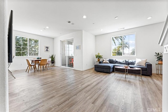 1166 Newberry Ln Unit 1, Claremont, CA 91711 - living area with light wood-style flooring and recessed lighting