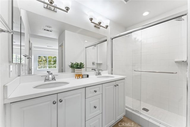 1166 Newberry Ln Unit 1, Claremont, CA 91711 - full bathroom featuring double vanity, a stall shower, and recessed lighting