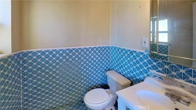 5772 Arrowhead Lake Rd, Hesperia, CA 92345 - bathroom with a wainscoted wall and vanity