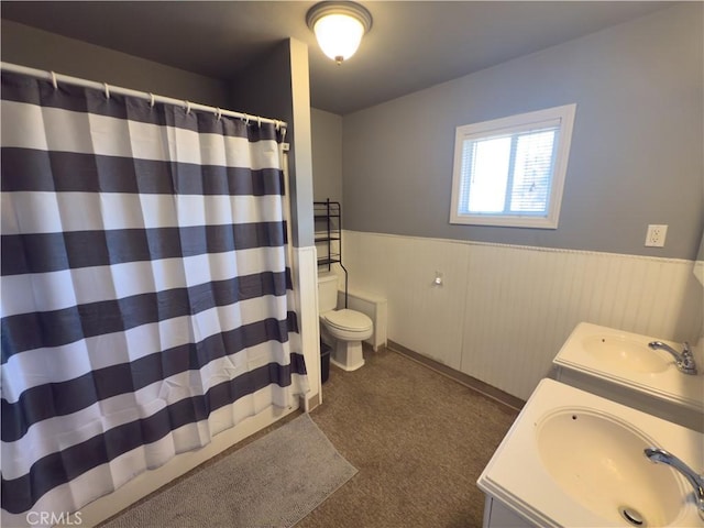 5772 Arrowhead Lake Rd, Hesperia, CA 92345 - full bathroom with a wainscoted wall, vanity, and a shower with shower curtain