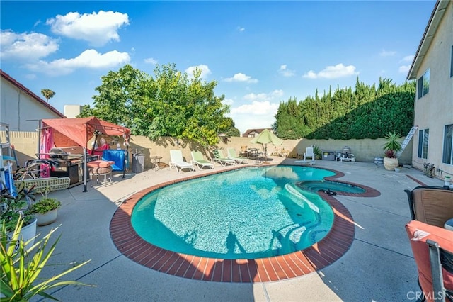 1740 Rada Rd, Hacienda Heights, CA 91745 - view of swimming pool featuring a patio area, a fenced backyard, and a pool with connected hot tub