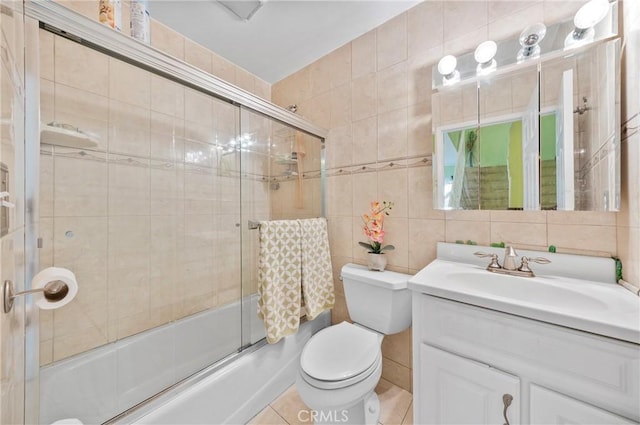 1740 Rada Rd, Hacienda Heights, CA 91745 - full bathroom featuring tile walls, vanity, combined bath / shower with glass door, and tasteful backsplash