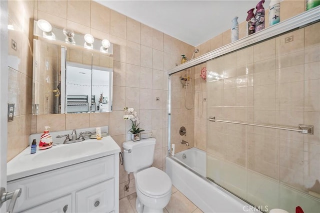 1740 Rada Rd, Hacienda Heights, CA 91745 - bathroom featuring tile walls, vanity, enclosed tub / shower combo, tile patterned floors, and tasteful backsplash