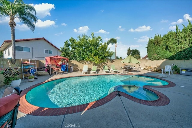 1740 Rada Rd, Hacienda Heights, CA 91745 - view of pool featuring a patio, a fenced backyard, and a pool with connected hot tub