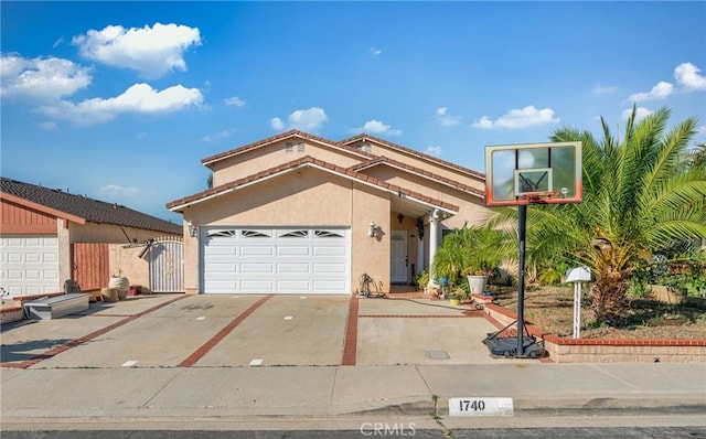 1740 Rada Rd, Hacienda Heights, CA 91745 - view of front of property with stucco siding, an attached garage, and concrete driveway