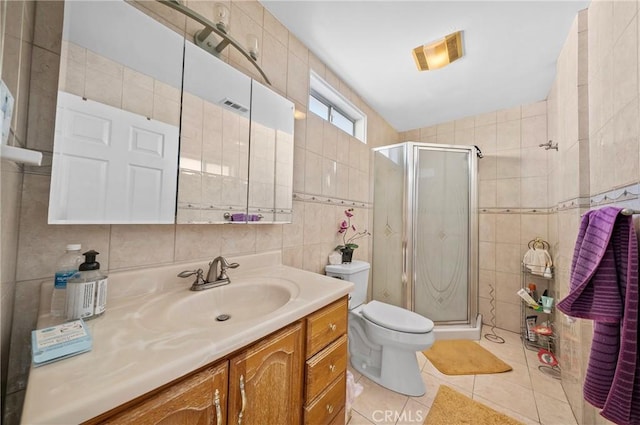 1740 Rada Rd, Hacienda Heights, CA 91745 - bathroom featuring tile walls, vanity, tile patterned floors, and a shower stall