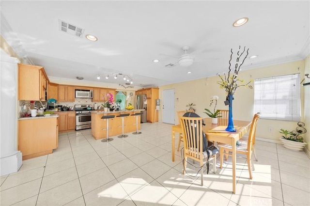 1740 Rada Rd, Hacienda Heights, CA 91745 - dining area featuring crown molding, light tile patterned floors, recessed lighting, a ceiling fan, and track lighting