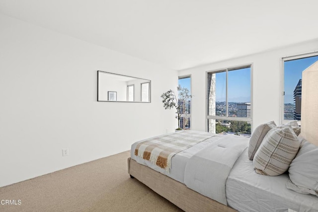 800 W 1st St Unit 1701, Los Angeles, CA 90012 - carpeted bedroom with a view of city
