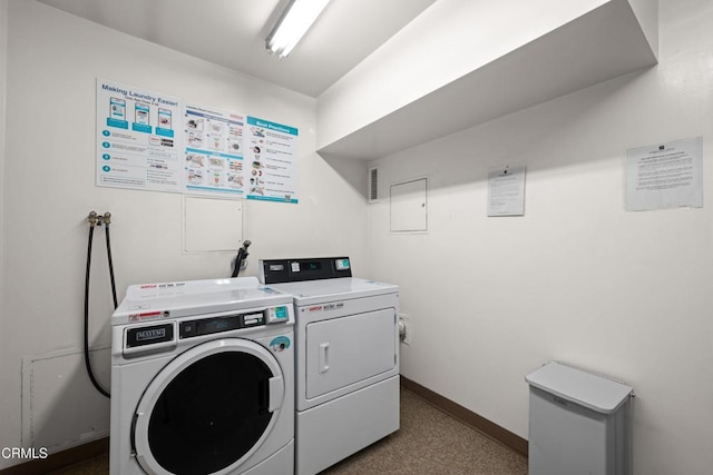 800 W 1st St Unit 1701, Los Angeles, CA 90012 - shared laundry room with washer and dryer and baseboards