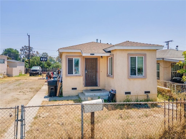13114 S Main St, Los Angeles, CA 90061 - bungalow-style house with crawl space, stucco siding, a shingled roof, and driveway