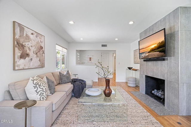 4520 Lone Pine Ln, La Canada Flintridge, CA 91011 - living area featuring light wood-style flooring, recessed lighting, and a fireplace