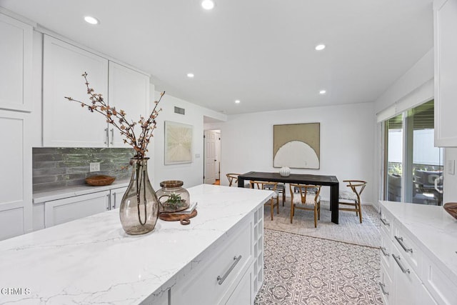 4520 Lone Pine Ln, La Canada Flintridge, CA 91011 - kitchen with white cabinetry, recessed lighting, light stone counters, and backsplash