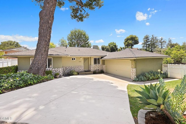 4520 Lone Pine Ln, La Canada Flintridge, CA 91011 - single story home featuring stucco siding, stone siding, and driveway