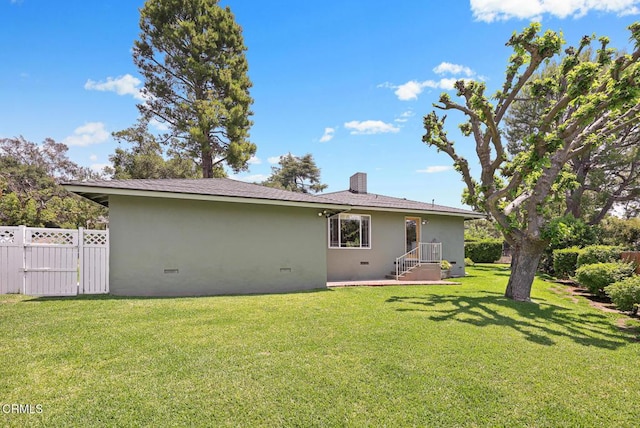 4520 Lone Pine Ln, La Canada Flintridge, CA 91011 - back of property featuring stucco siding, a chimney, crawl space, and a gate