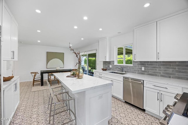 4520 Lone Pine Ln, La Canada Flintridge, CA 91011 - kitchen with stainless steel dishwasher, recessed lighting, a kitchen island, white cabinets, and tasteful backsplash