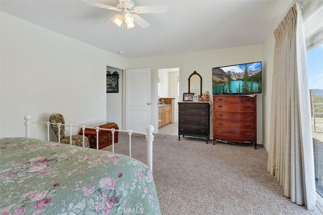 45337 Valley Oak Dr, Ahwahnee, CA 93601 - bedroom with light carpet, ceiling fan, and ensuite bathroom