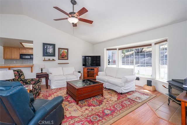 45337 Valley Oak Dr, Ahwahnee, CA 93601 - living area with lofted ceiling, light wood-type flooring, and a ceiling fan
