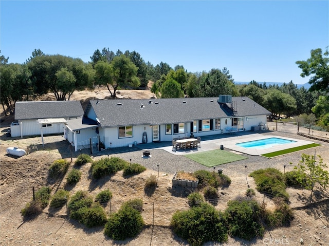 45337 Valley Oak Dr, Ahwahnee, CA 93601 - back of house featuring a patio and a shingled roof
