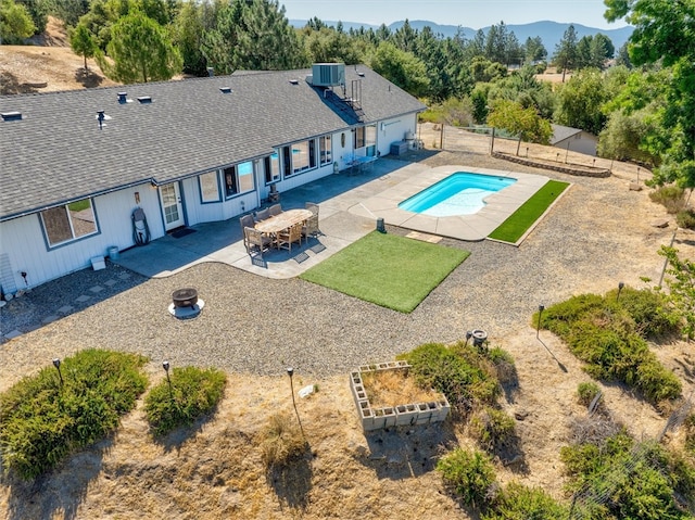 45337 Valley Oak Dr, Ahwahnee, CA 93601 - view of pool with a patio area, a fenced backyard, and a mountain view