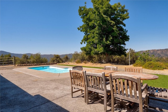 45337 Valley Oak Dr, Ahwahnee, CA 93601 - view of pool featuring a mountain view and a patio area