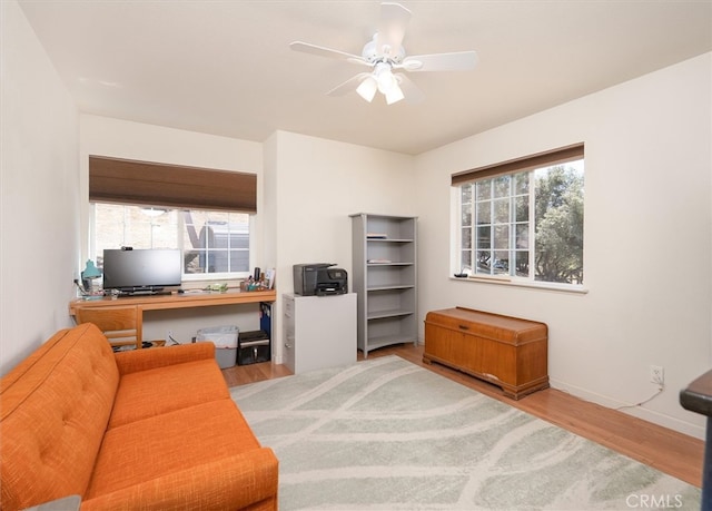 45337 Valley Oak Dr, Ahwahnee, CA 93601 - home office featuring wood finished floors, plenty of natural light, and ceiling fan