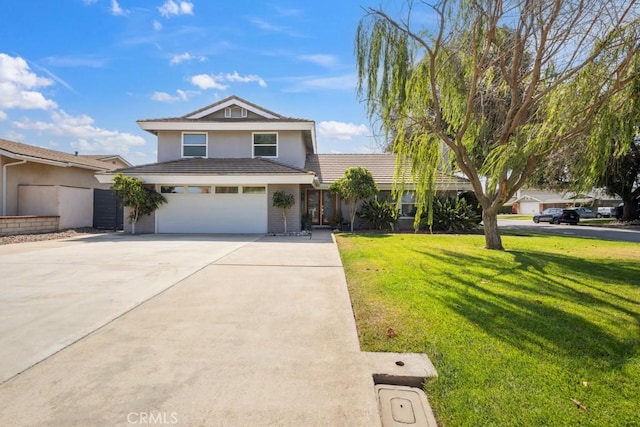 3314 Benton Ave, La Verne, CA 91750 - view of front facade with concrete driveway, stucco siding, a front lawn, a tile roof, and an attached garage