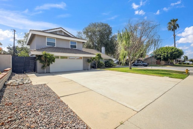 3314 Benton Ave, La Verne, CA 91750 - view of front of property with driveway, an attached garage, stucco siding, and a tiled roof