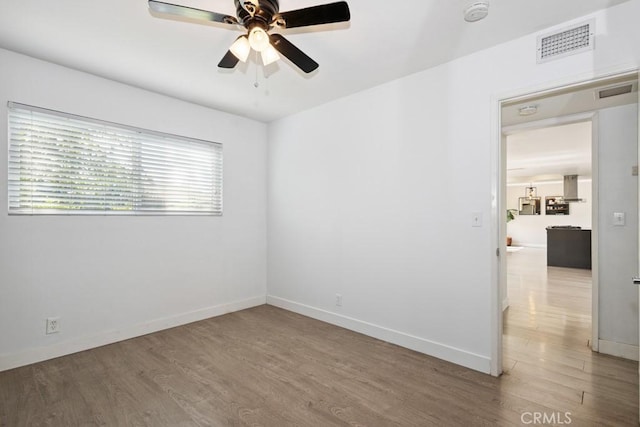 3314 Benton Ave, La Verne, CA 91750 - unfurnished room featuring a smoke detector, wood finished floors, and ceiling fan