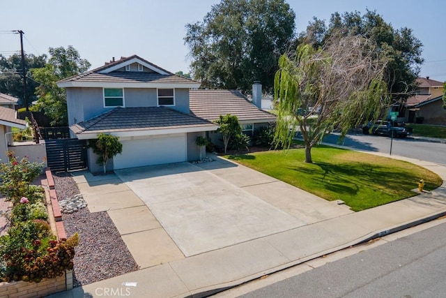 3314 Benton Ave, La Verne, CA 91750 - traditional-style home with a front lawn, driveway, a tile roof, and stucco siding