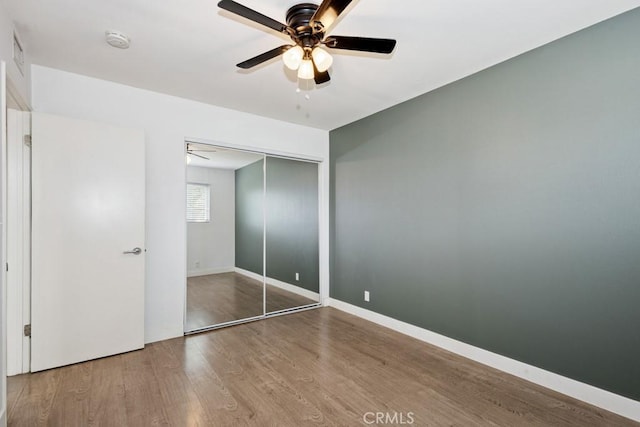 3314 Benton Ave, La Verne, CA 91750 - unfurnished bedroom with wood finished floors, a closet, and a ceiling fan