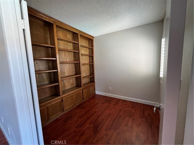 22 Country Mile Rd, Pomona, CA 91766 - unfurnished room featuring dark wood-style flooring and a textured ceiling