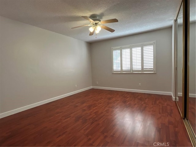 22 Country Mile Rd, Pomona, CA 91766 - spare room featuring ceiling fan, dark wood-type flooring, and a textured ceiling
