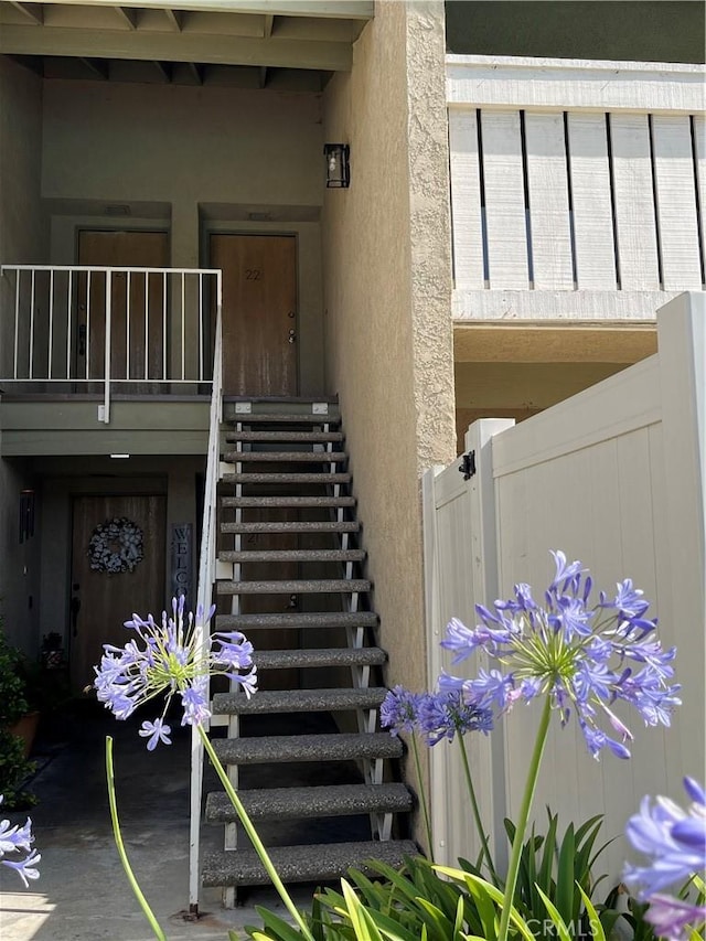 22 Country Mile Rd, Pomona, CA 91766 - doorway to property featuring stucco siding