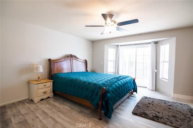 26511 Mainsail Ln, Helendale, CA 92342 - bedroom featuring light wood-style flooring and a ceiling fan