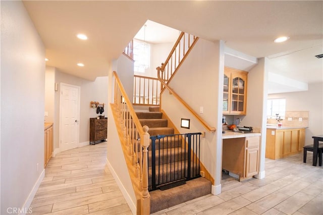 26511 Mainsail Ln, Helendale, CA 92342 - stairs with wood tiled floors and recessed lighting