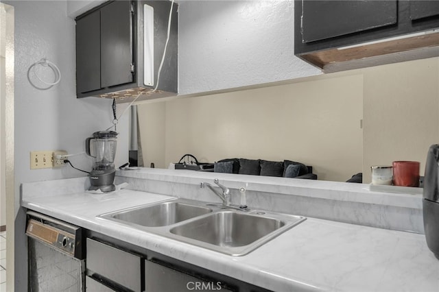 11286 Parkside Ln Unit 22, Garden Grove, CA 92843 - kitchen with black dishwasher and light countertops