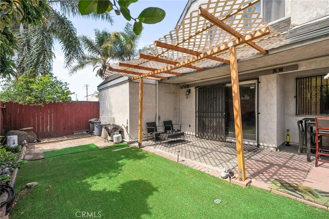 11286 Parkside Ln Unit 22, Garden Grove, CA 92843 - view of yard featuring a pergola and a patio area
