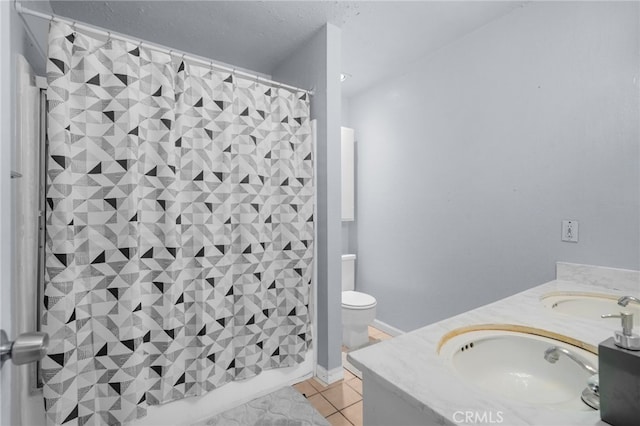 11286 Parkside Ln Unit 22, Garden Grove, CA 92843 - bathroom with double vanity, a shower with shower curtain, and tile patterned flooring