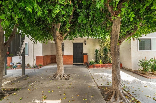 11286 Parkside Ln Unit 22, Garden Grove, CA 92843 - view of front facade with stucco siding