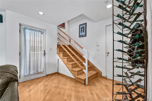 16745 Bayview Dr Unit B, Sunset Beach, CA 90742 - stairs with wood finished floors and recessed lighting