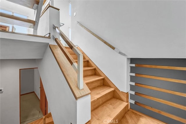 16745 Bayview Dr Unit B, Sunset Beach, CA 90742 - stairs with wood finished floors